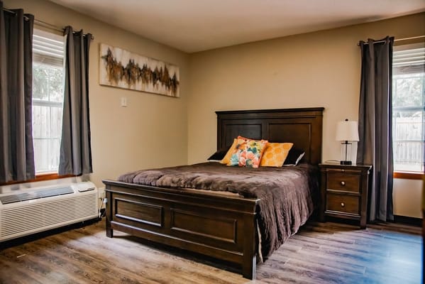 Cozy private room with a bed and decor