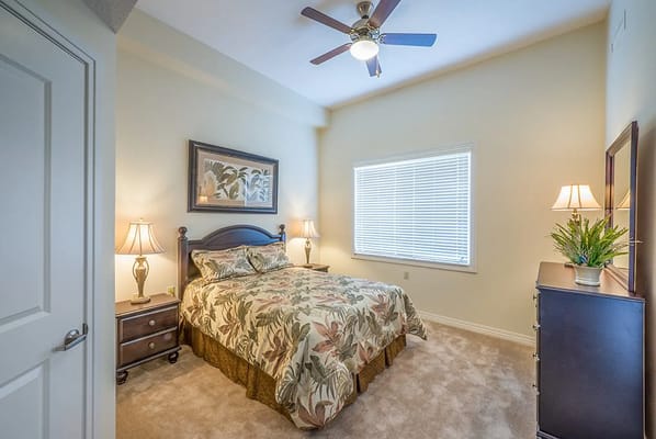 Well-decorated private bedroom in assisted living facility