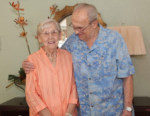 A smiling couple enjoying time together indoors