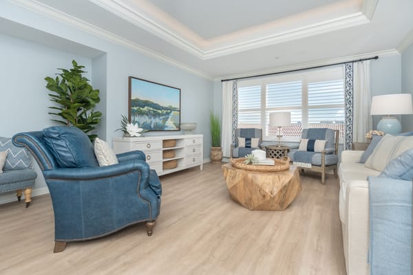 Bright common area with comfortable seating and decor