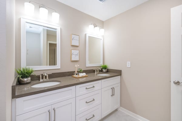 Bright and modern bathroom with dual sinks