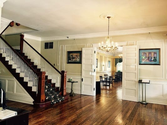 Interior view of a welcoming common area with stairs