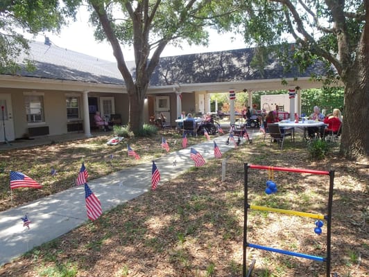 Residents enjoying an outdoor activity with decorations