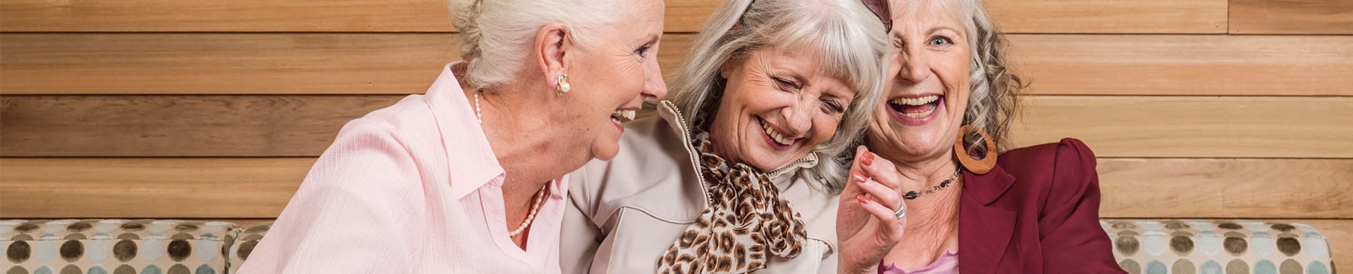 Three smiling women enjoying time together