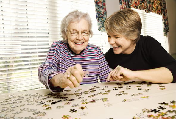 Residents engaging in a puzzle activity