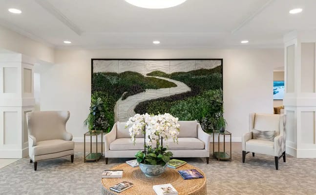 Bright common area with comfortable seating and decor