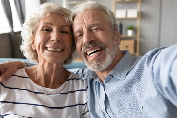 Happy senior couple smiling together