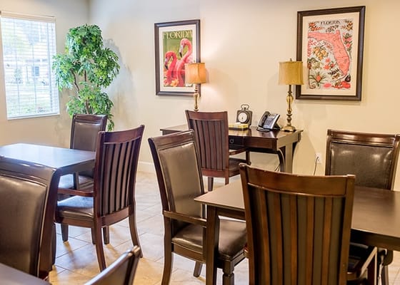 Interior common area with dining tables and decor