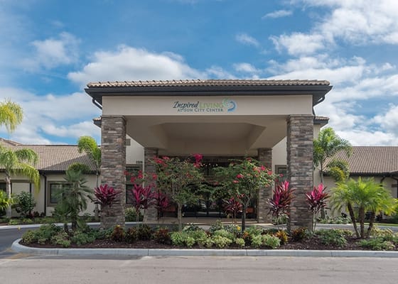 Exterior view of Inspired Living at Sun City Center with landscaping