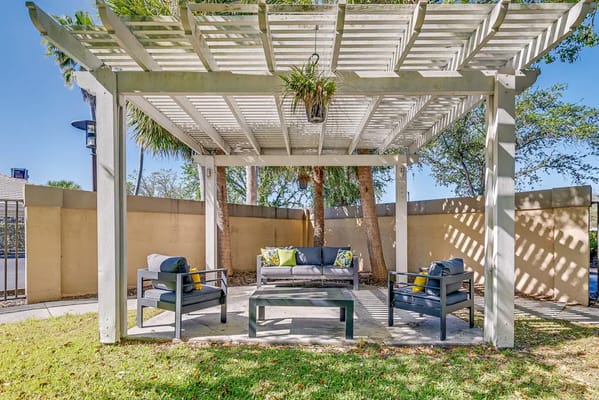 Outdoor seating area under a pergola
