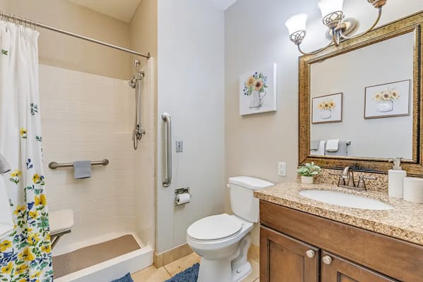 Well-decorated bathroom in a senior living facility