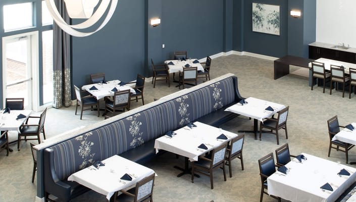 Dining room with tables set for a meal