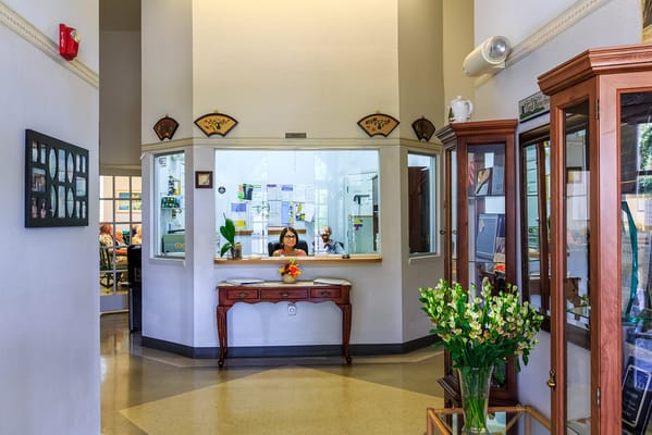 Reception area with staff member at desk