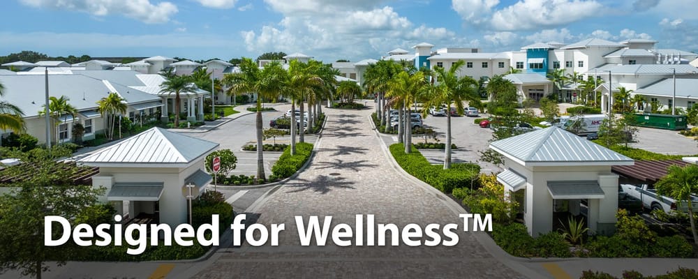 Aerial view of the Luxe Senior Living campus with landscaped driveways