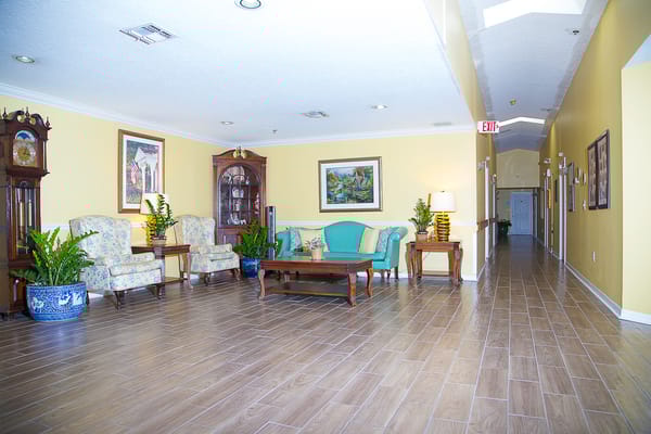 Bright common area with seating and plants