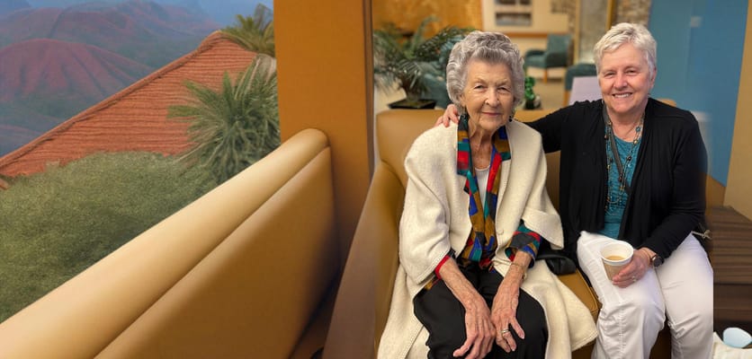 Residents enjoying companionship in a cozy common area