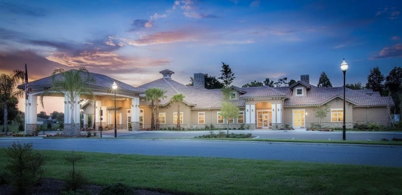 Exterior view of Mission Oaks Assisted Living at dusk