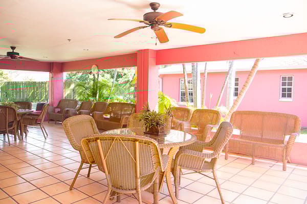 Outdoor seating area with tables and chairs