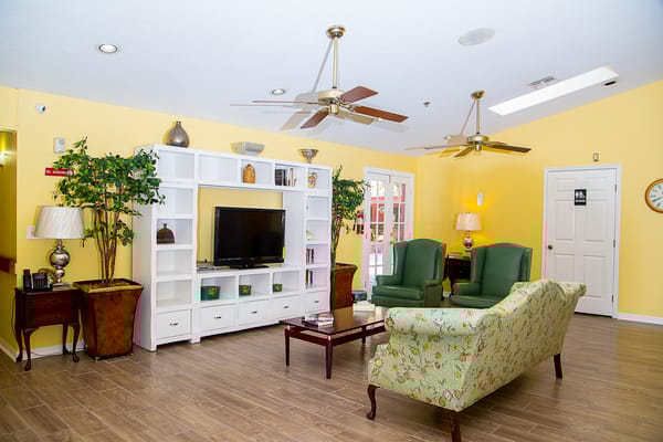 Bright common area with seating and decor