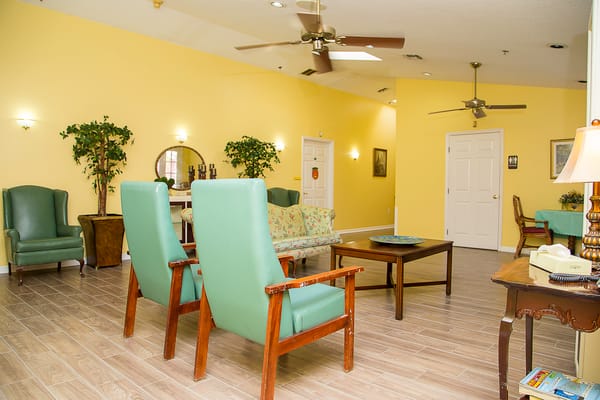 Bright, inviting interior of a common area with seating