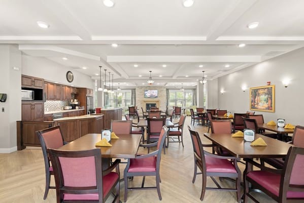 Dining area with tables and chairs arranged
