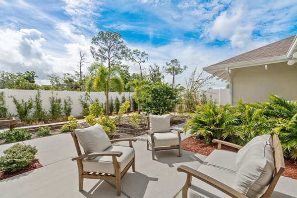 Outdoor seating area with garden view