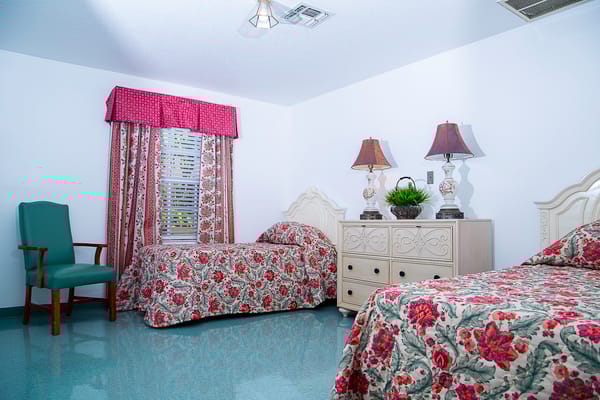 Cozy shared resident room with floral decor