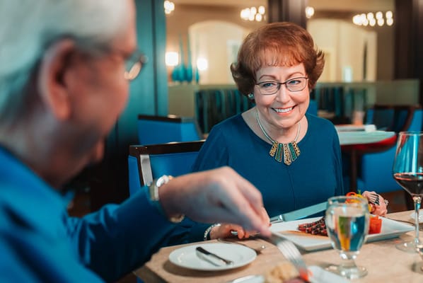 Residents enjoying a meal in a dining area