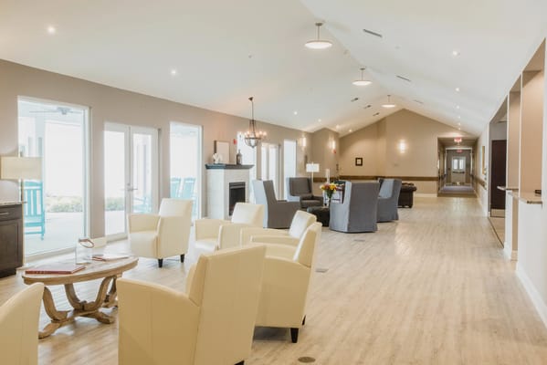 Bright common area with seating and natural light