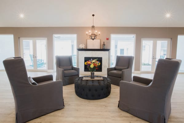 Interior view of a cozy common area with chairs