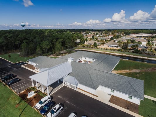 Aerial view of Navarre Gardens facility with parking