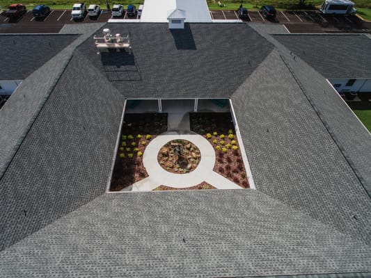Aerial view of a courtyard surrounded by the facility building