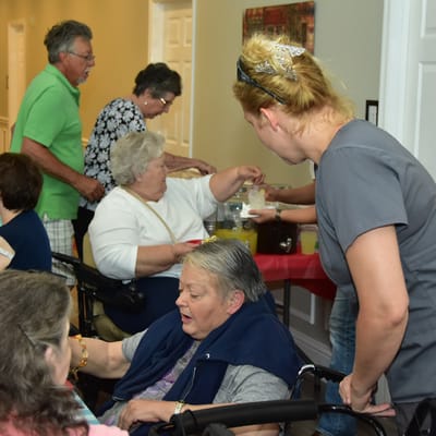 Residents and staff participating in a community activity