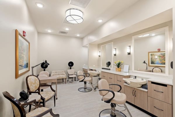 Interior of a salon with styling chairs and mirrors