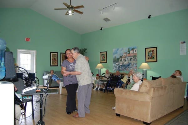 Residents enjoying a social activity in the common area