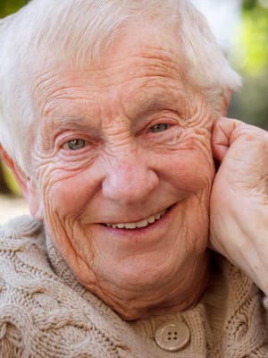 Close-up of a smiling elderly woman