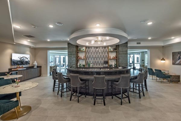 Interior view of a common area with a bar and seating