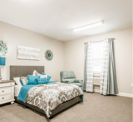 Cozy interior of a resident's bedroom with decor
