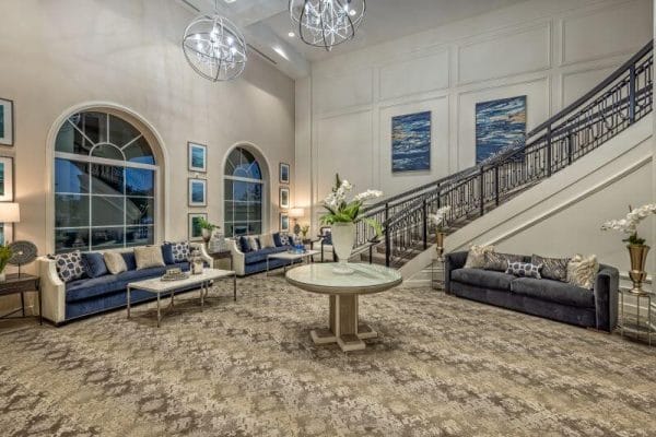 Bright, spacious lobby area with seating and decor