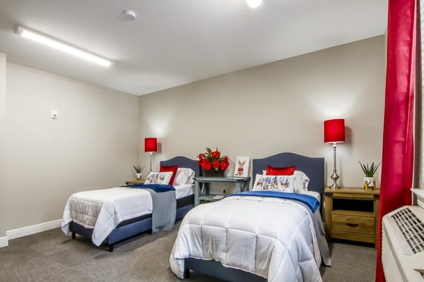 Bright twin bedroom with floral decor