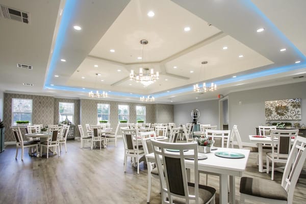 Bright dining room with modern decor and seating