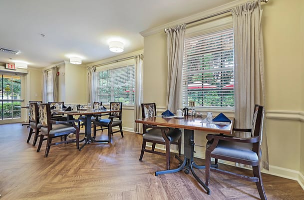 Bright dining room with tables and chairs