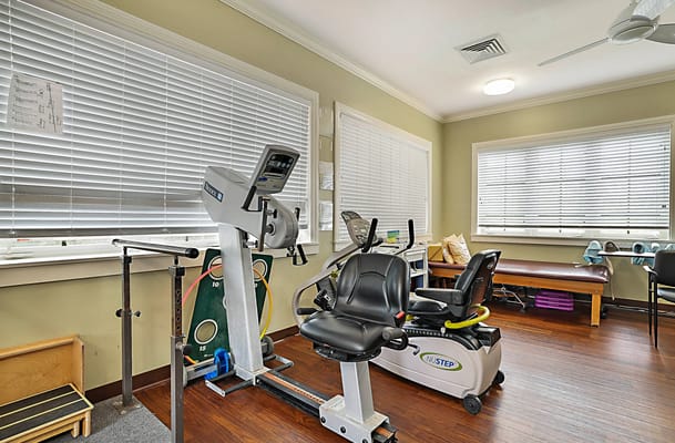 Interior view of a fitness room with exercise equipment