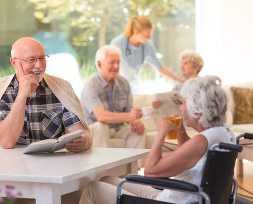 Residents socializing in a lively common area