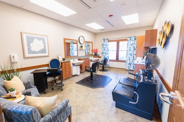 Interior salon room with chairs and mirrors