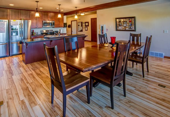 Bright dining room area with wooden furniture