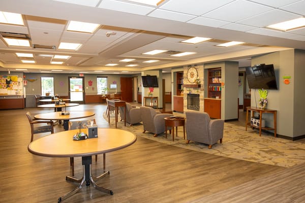 Bright common area with tables and seating