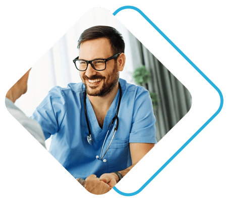 Healthcare professional smiling in a caregiving setting