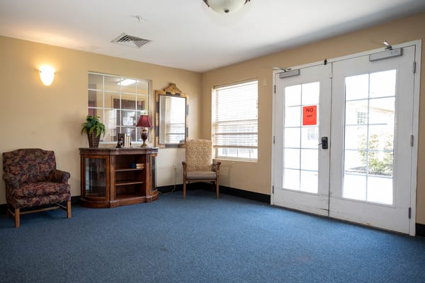 Interior common area with seating and natural light