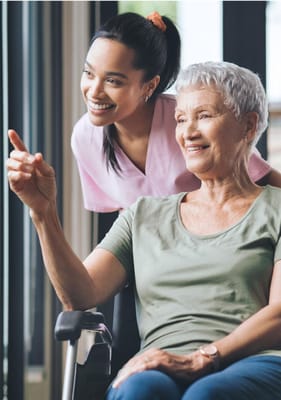 Caregiver and resident enjoying a moment together